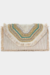 PUKA SHELL FRINGE DETAIL CLUTCH BAG